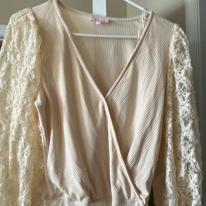 Pink lily cream bodysuit